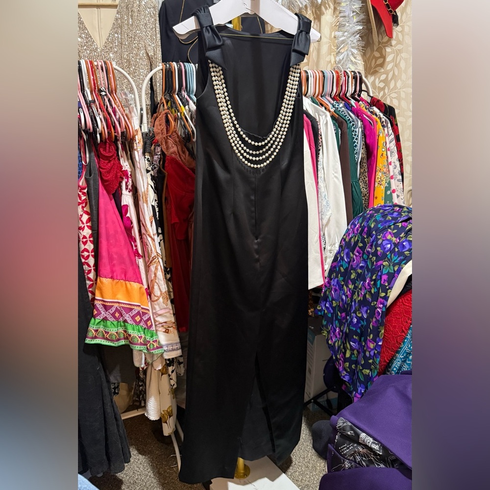 Alex Evenings Black Sleeveless Jumpsuit with Draped Pearl Strands